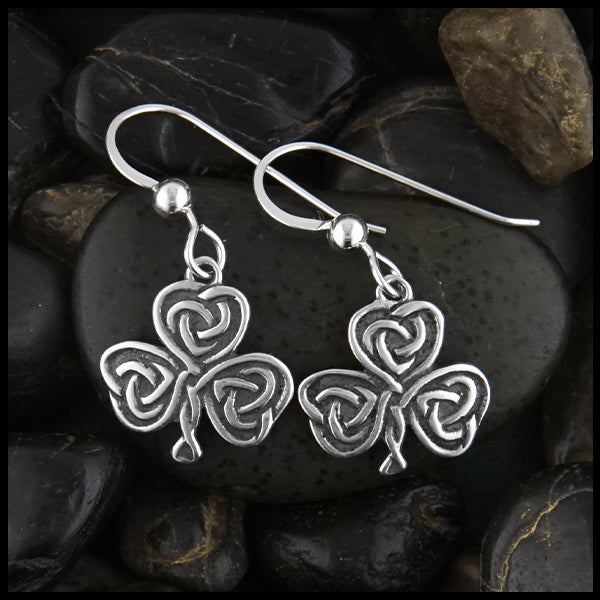 Overhead view of Heart Shaped Shamrock Drop Earrings