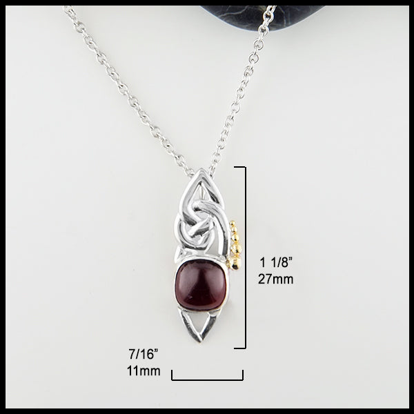 1 1/8 by 7/16 inches Celtic Pendant with Cabochon Garnet