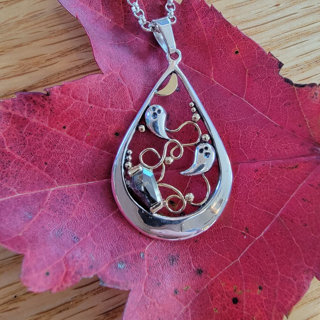 Custom ghost pendant with salt and pepper diamond