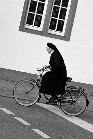 Nun on Bicycle