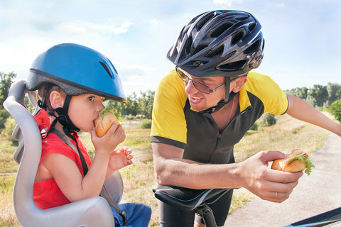 Cyclist eating snacks