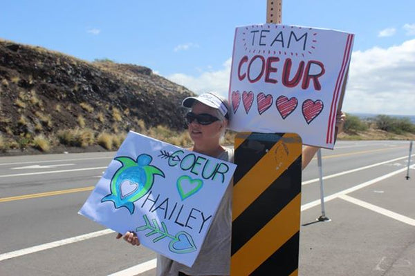 Coeur Signs at a race