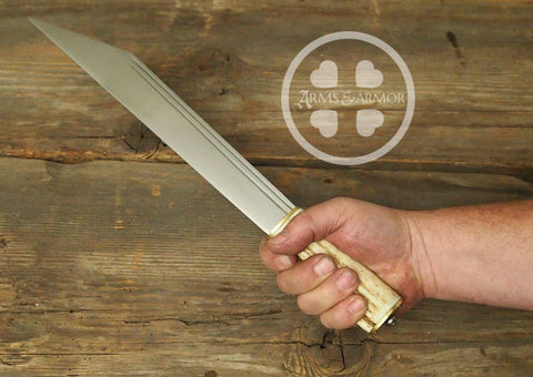 Antler gripped Seax in hand