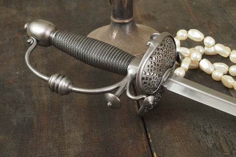 Pierced plate smallsword with large beads