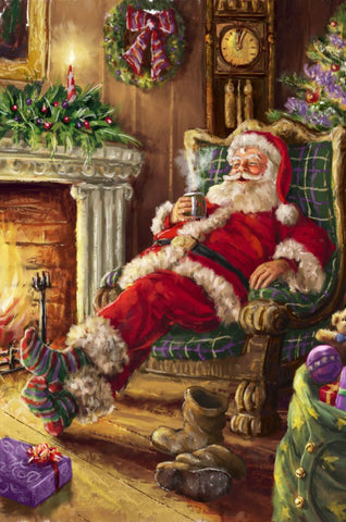 Santa relaxing in front of fire