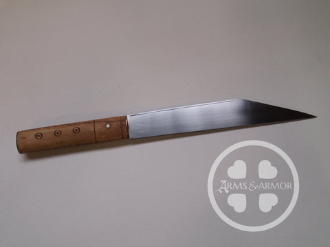 Broke back seax with ash grip and copper bolster.