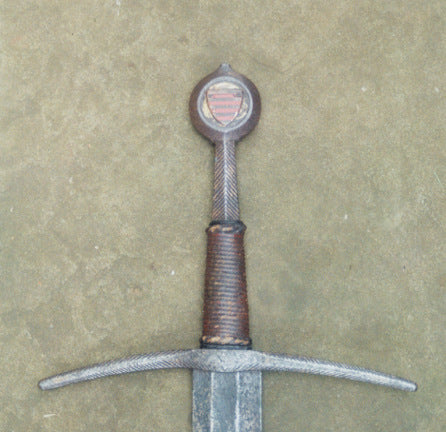 Medieval sword with upper grip made from the shaped tang.
