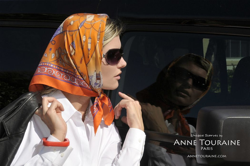 French silk scarves by ANNE TOURAINE Paris™: China inspired neon orange scarf tied as a small headscarf