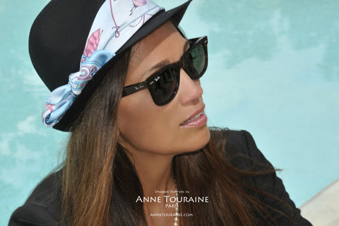 Blue scarf by ANNE TOURAINE Paris™ tied around a black felt hat