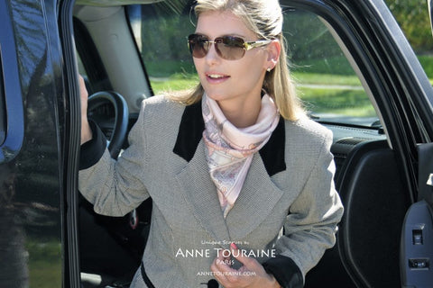 French silk scarf, Paris theme, pink color, by ANNE TOURAINE Paris™ tied around the neck in a fluffy kerchief
