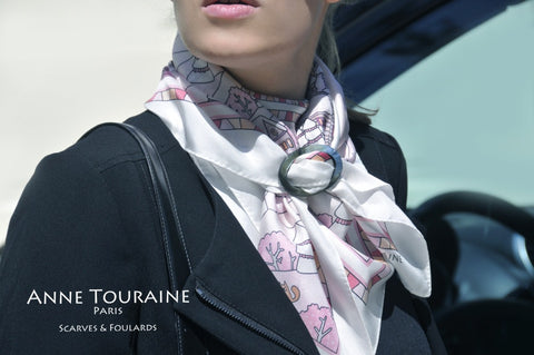 French silk scarf, winter theme, pink color, by ANNE TOURAINE Paris™ tied around the neck and secured with a scarf ring