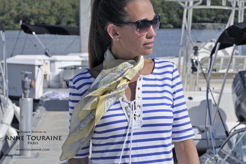 Yellow silk scarf by ANNE TOURAINE Paris™ worn on a fancy striped dress