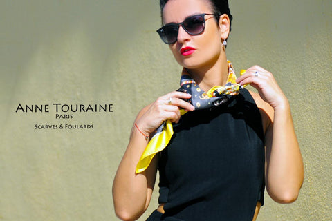Astrology zodiac inspired silk scarf by ANNE TOURAINE Paris™; yellow color; tied around the neck; perfect with a black top!