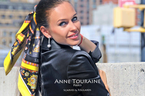 Astrology zodiac inspired silk scarf by ANNE TOURAINE Paris™; yellow color; tied around a ponytail; perfect with a black top!