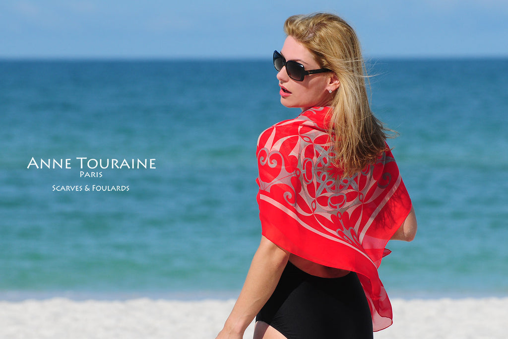 Extra large silk chiffon scarves by ANNE TOURAINE Paris™: red scarf wrapped around the shoulders