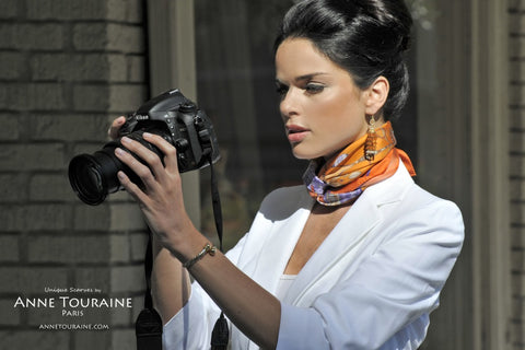French silk scarf, Silk Road theme, orange color, by ANNE TOURAINE Paris™ tied around the neck 