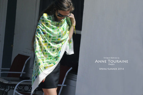 green and white extra large silk scarf by ANNE TOURAINE Paris™ tied as a wrap over a little black dress. 