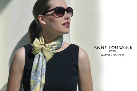 Yellow silk scarves by ANNE TOURAINE Paris™ with a scarf ring. Butterfly knot