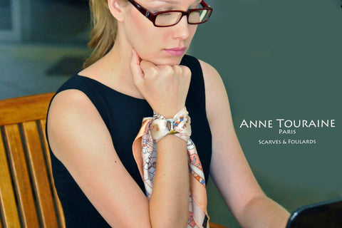 Russian inspired scarves: peach silk scarf by ANNE TOURAINE Paris™ tied around the wrist with a scarf ring