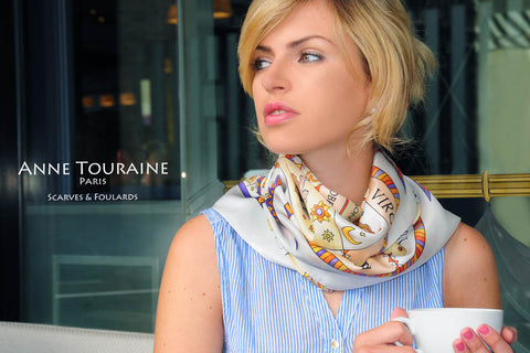 Zodiac inspired scarves: white ASTROLOGICAL silk scarf by ANNE TOURAINE Paris™ worn loose around the neck