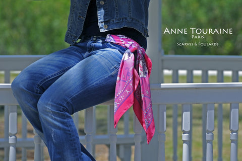 French silk scarf, pink color, by ANNE TOURAINE Paris™. Tied as a half belt on a pair of jeans