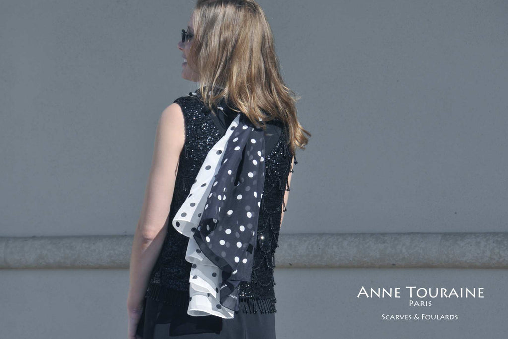 Chiffon silk scarves by ANNE TOURAINE Paris™: black polka dot scarf and white polka dot scarf tied together at the back 