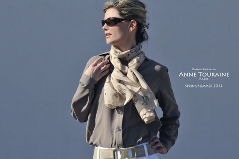 Beige chiffon silk scarf by ANNE TOURAINE Paris™ with dog pattern tied loose around the neck