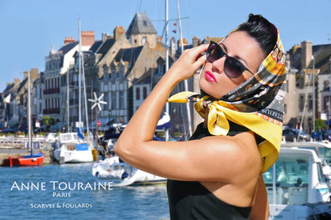 French silk scarves by ANNE TOURAINE Paris™: Zodiac inspired yellow scarf tied as a head scarf à la Jackie Kennedy