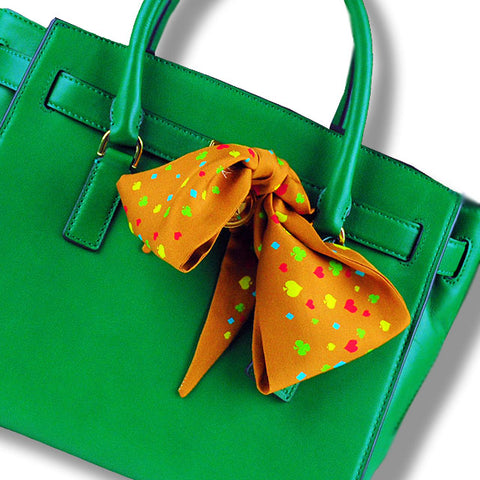 twillies by ANNE TOURAINE Paris™; brown twilly tied around a green handbag