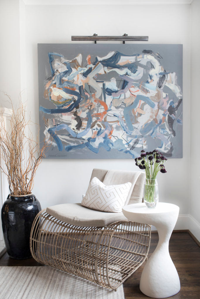 Wow! What a great corner. And yes, we believe that chair came from <a href="https://huffharrington.com/collections/furniture/seating" target="_blank">Huff Harrington Home</a>! Photo: Sarah Dorio