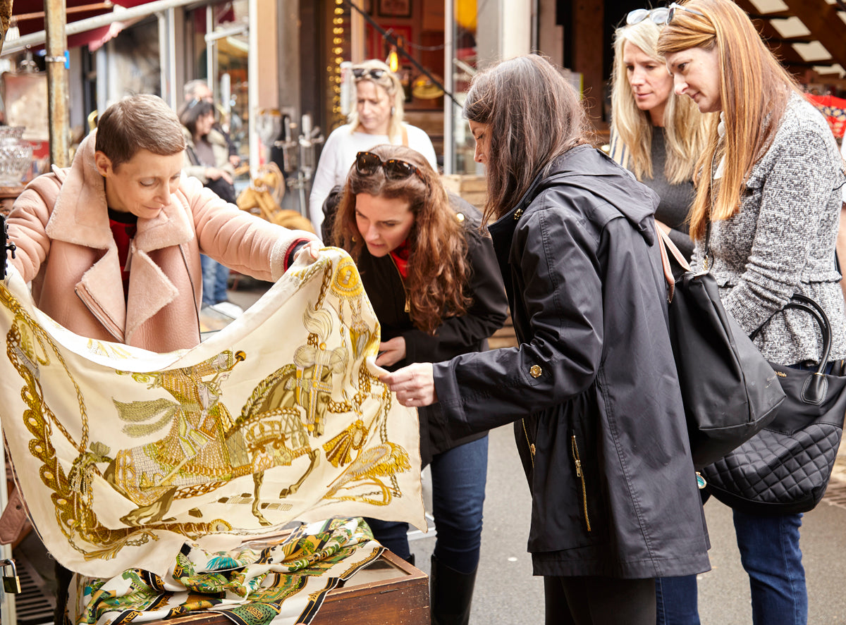 Examining .... (sometimes  it takes a village to buy a vintage Hermes scarf!)