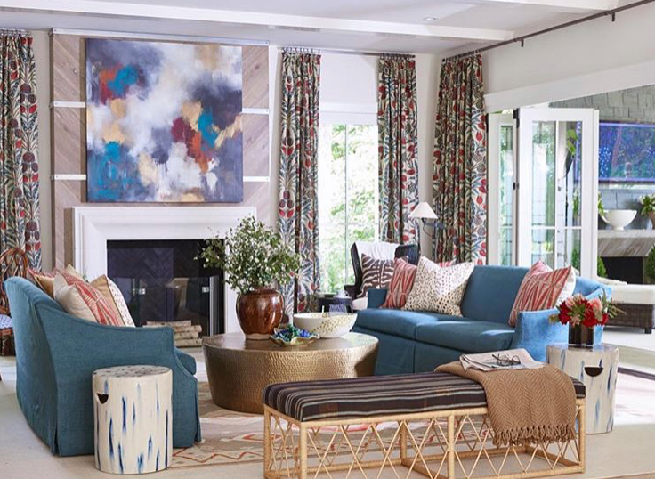 The finished family room with its shades of blue, raspberry and gold.  We were thrilled with the way the painting looks over the fireplace.  (photo: Victoria Pearson)