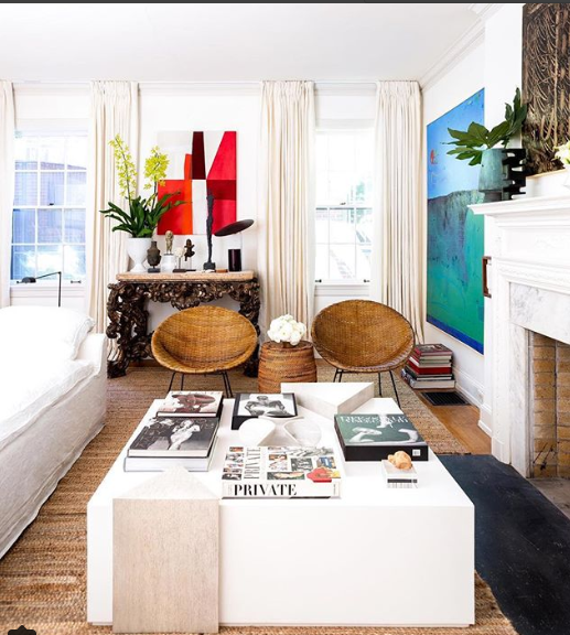 See how he has paired a crunchy console with statement art and mixed it with modern furniture.