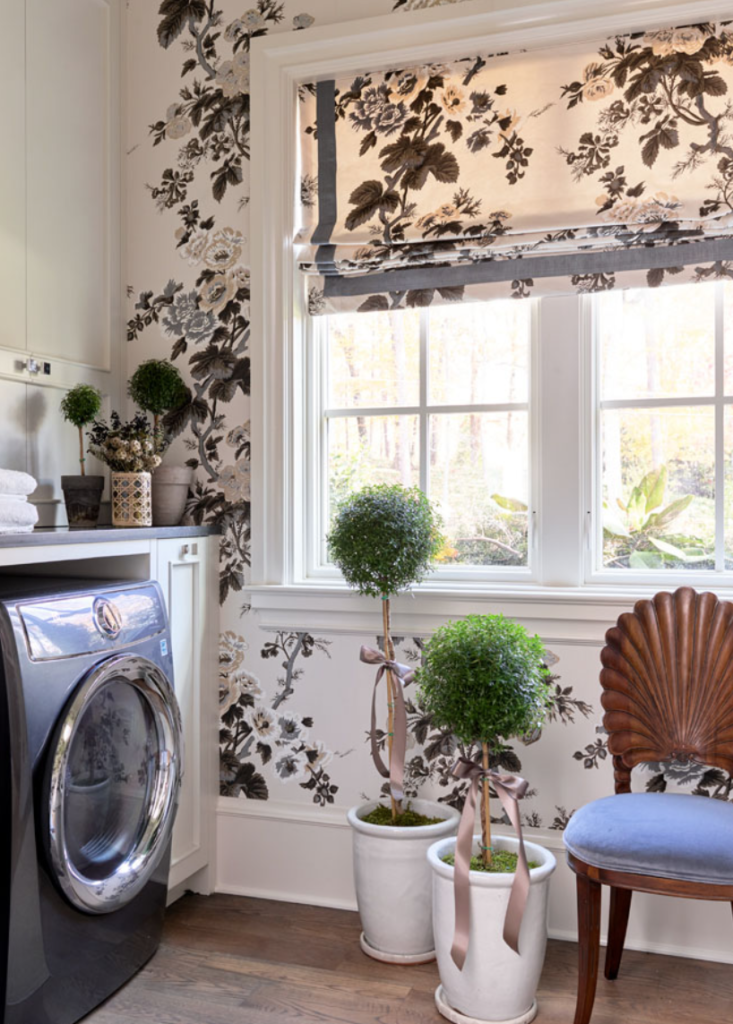 <a href="https://www.laurenelaineinteriors.com/" target="_blank">Lauren Elaine Interiors</a> used Pyne Hollyhock wallpaper to make a statement in the cheerful and absolutely adorable (and Instagrammable!) laundry room.