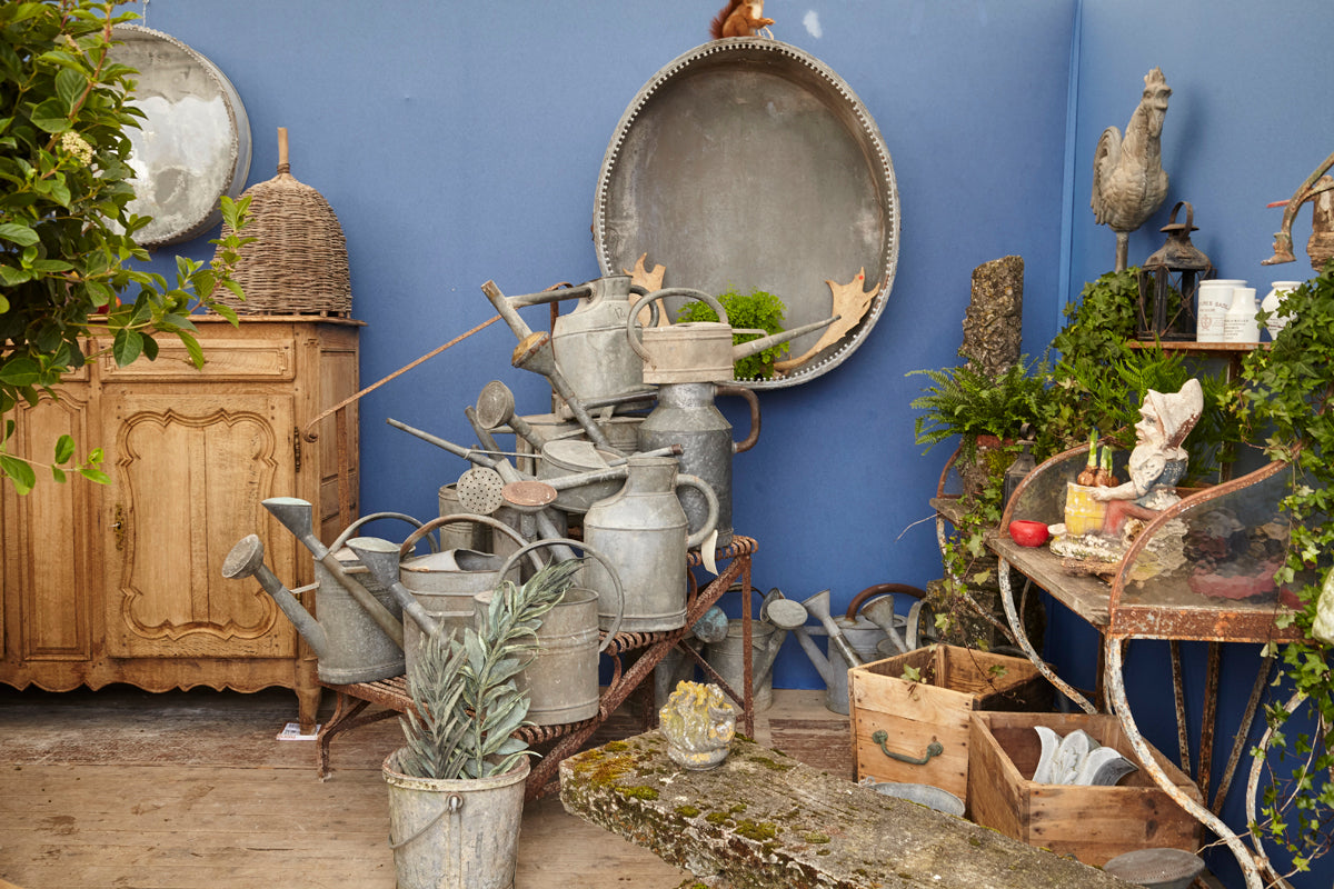 But somehow we passed on this group of watering cans (as cute as they are)