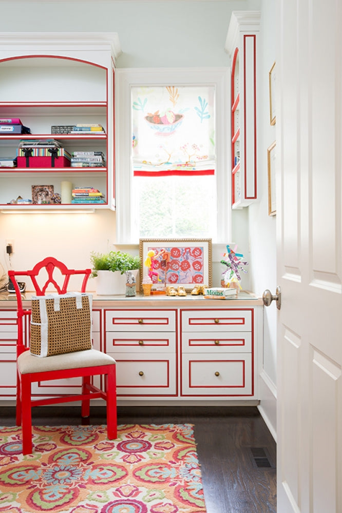 No detail is overlooked by Mallory Mathison's keen eye, as seen in this darling craft room with its red undertones.