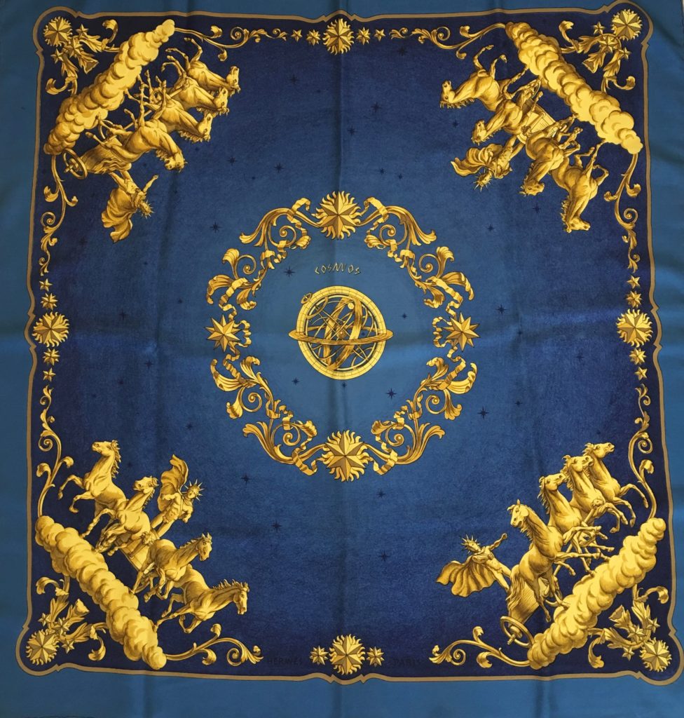 <a target="_blank" href="https://huffharrington.com/collections/accessories/products/vintage-hermes-scarf">Cosmos</a> – very rich and vibrant with its gold and navy palette.  First introduced in 1966 and designed by Philippe LeDoux.