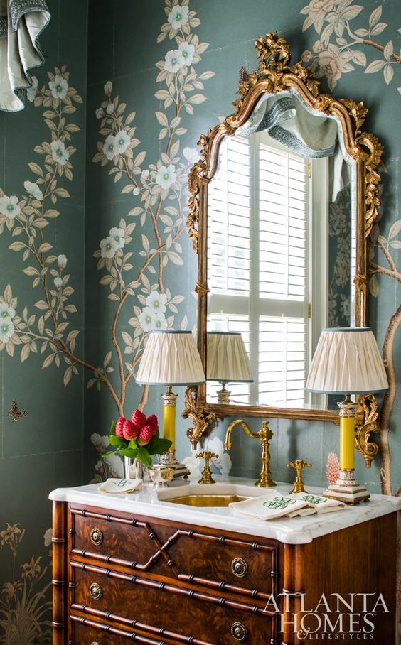 Mallory decorated such a pretty powder room with the perfectly unexpected candlestick lamps that provide the exclamation point in this vignette.