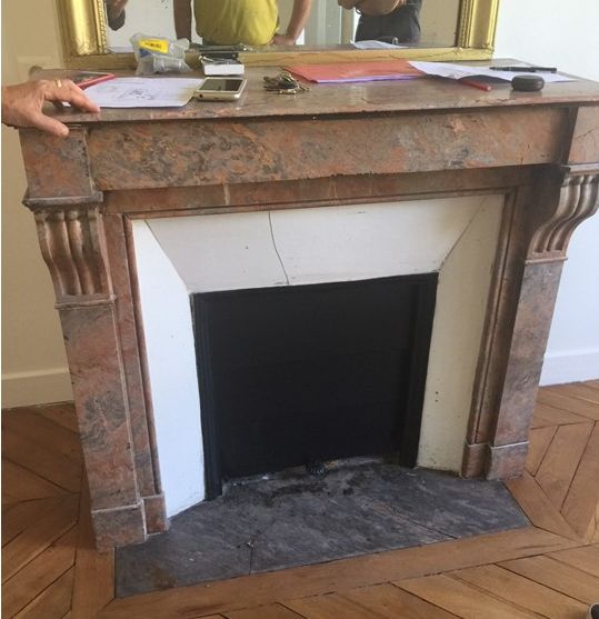 And although it was oozing with charm, we had a couple of challenges ahead of us, including a fireplace front and center that didn't have the prettiest marble.