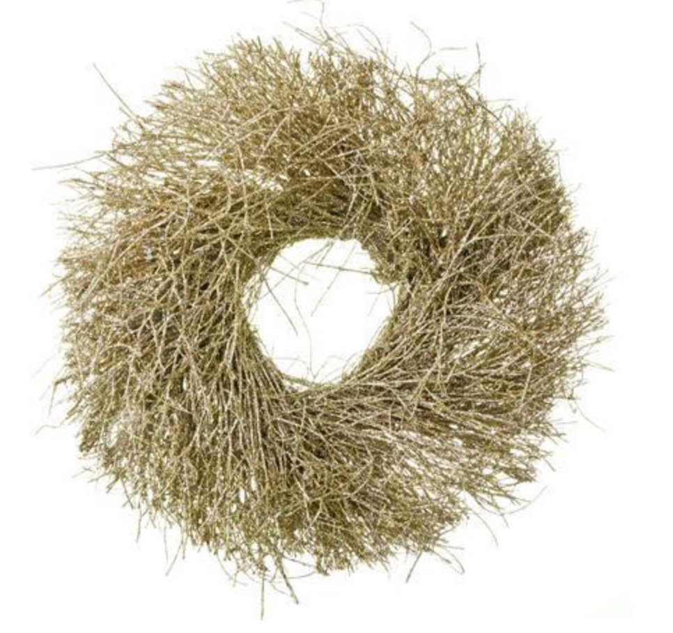 We love <a href="https://huffharrington.com/collections/decor/products/glitter-wreaths-1?variant=4904116912158" target="_blank">glitter wreaths</a> – especially when they’re hung over a Louis mirror.