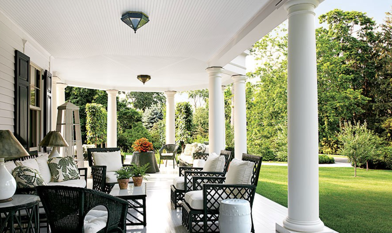 Miles Redd did this gorgeous and inviting porch. <a href="https://www.architecturaldigest.com/" target="_blank">Architectural Digest</a>, photography by Miguel Flores-Vianna.
