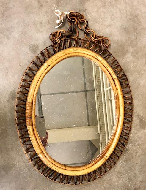 We fell for the age and patina on this mirror, along with its pretty necklace!
