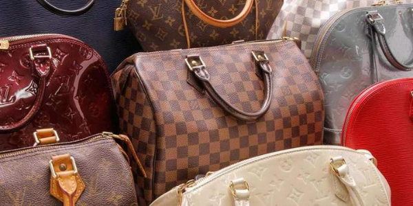Photo with several Louis Vuitton bags, to show the different materials available.
