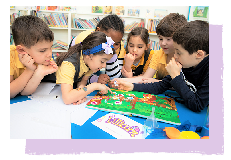 Primary school 6 children playing in class with The Adventures of Lillicorn in WooWoo Land by QuestFriendz