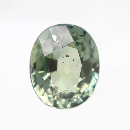 1.44 Carat Light Earthy Green Oval Sapphire for Custom Work - Inventory Code GOS144 - Midwinter Co. Alternative Bridal Rings and Modern Fine Jewelry