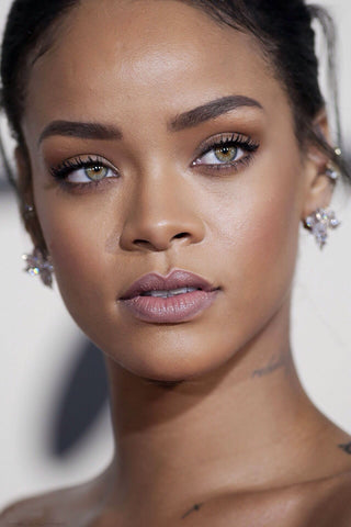 get Rihanna coloured eyes. coloured contact lenses like Rihanna