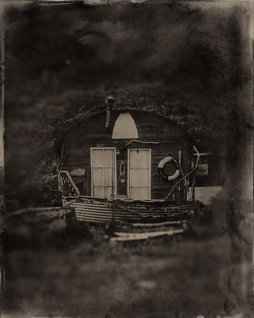 tin type of a fishermans hut at port mulgrave