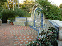 Mexican tile outdoor fountain and arch