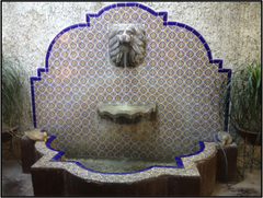 Mexican tile outdoor fountain lion head