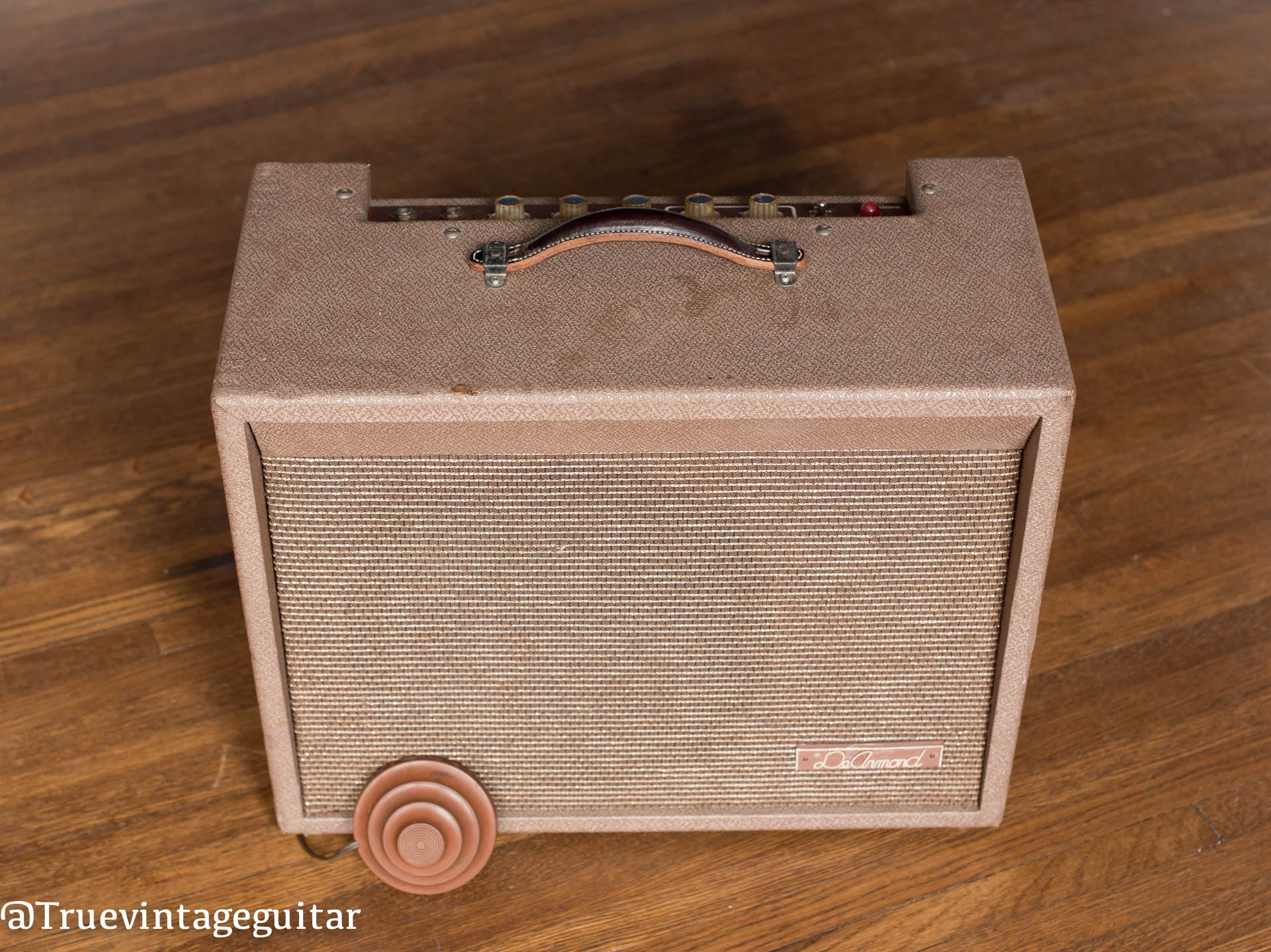 Old brown guitar amplifier Dearmond